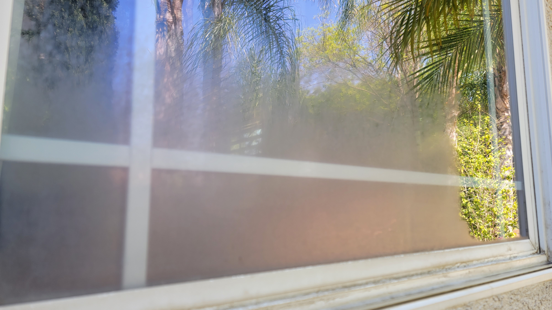 Hard water stain removal on residential glass